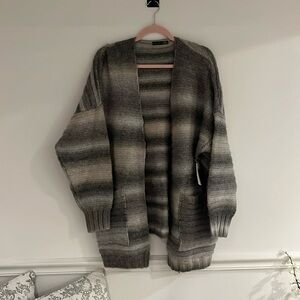 Black tape_ sweater